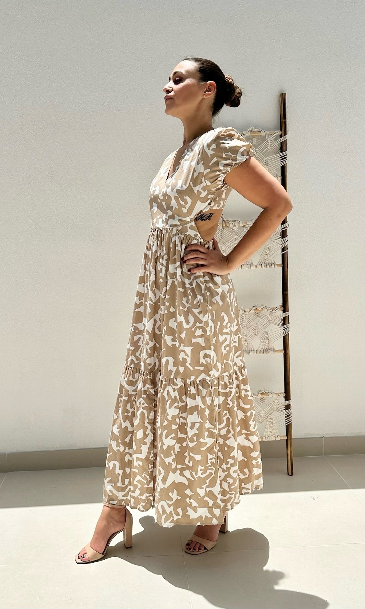 Female model wearing Savanna Open Back Dress - Beige- showcasing the latest ladies fashion with free delivery 