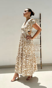 Female model wearing Savanna Open Back Dress - Beige- showcasing the latest ladies fashion with free delivery 