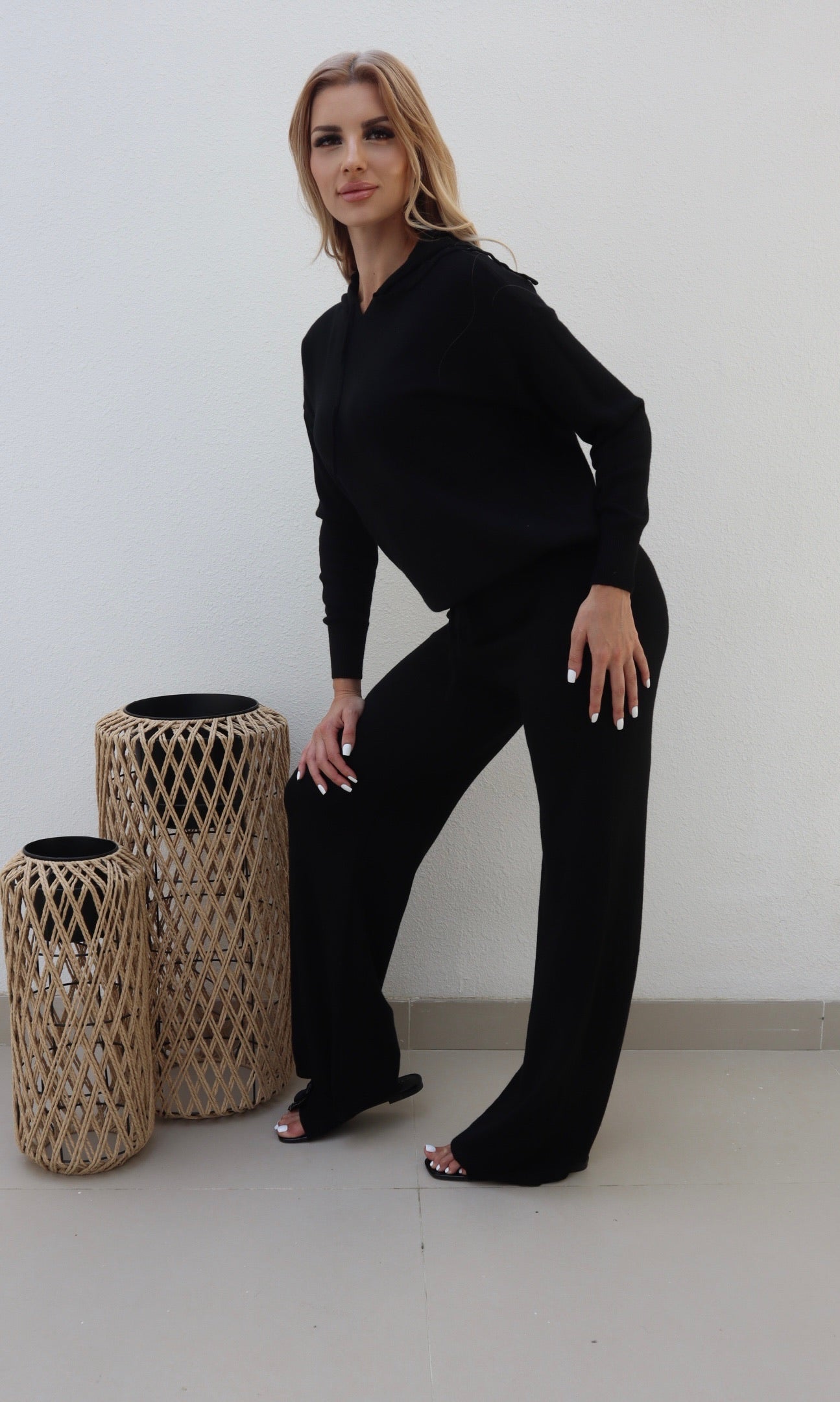 Female model wearing Bonnie Knitted Lounge Suit - Black- showcasing the latest ladies fashion with free delivery 