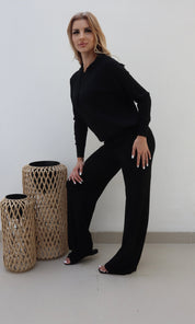 Female model wearing Bonnie Knitted Lounge Suit - Black- showcasing the latest ladies fashion with free delivery 