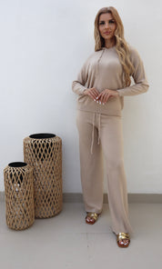 Female model wearing Bonnie Knitted Lounge Suit - Beige- showcasing the latest ladies fashion with free delivery 