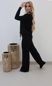 Female model wearing Bonnie Knitted Lounge Suit - Black- showcasing the latest ladies fashion with free delivery 