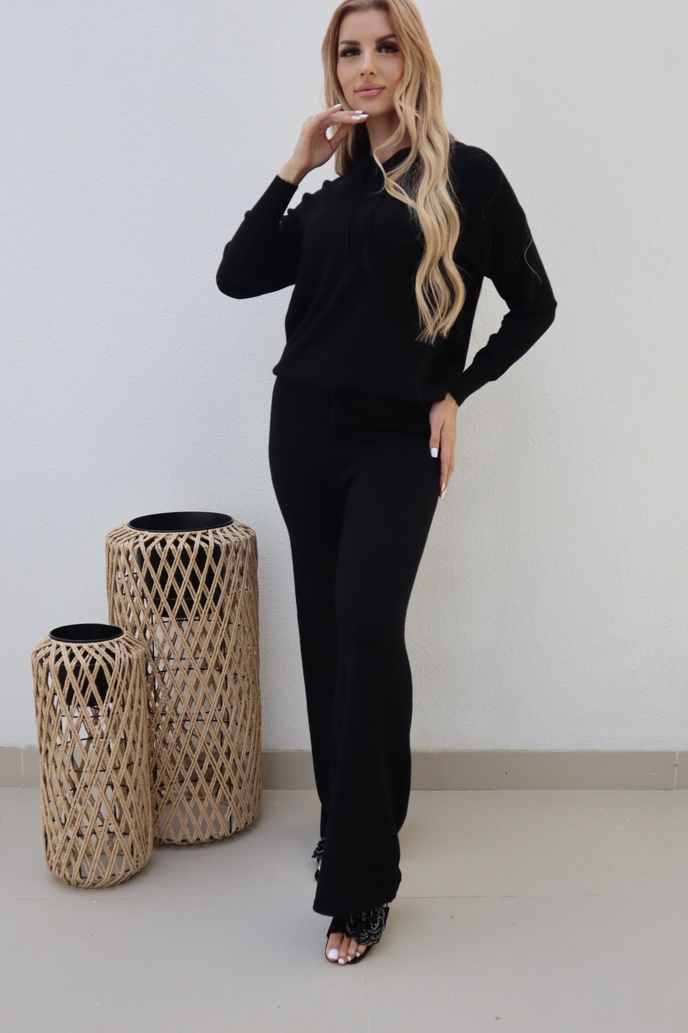 Female model wearing Bonnie Knitted Lounge Suit - Black- showcasing the latest ladies fashion with free delivery 