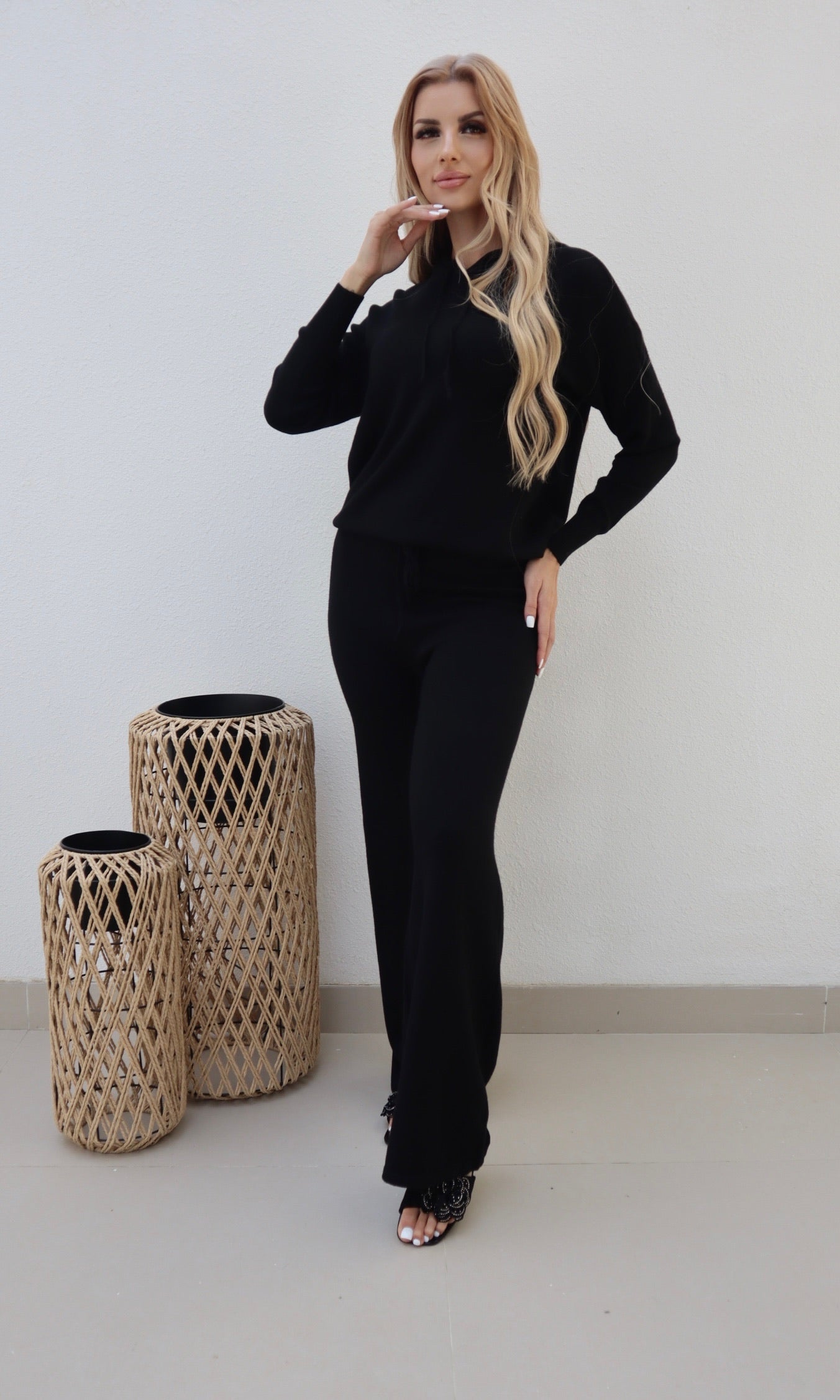 Female model wearing Bonnie Knitted Lounge Suit - Black- showcasing the latest ladies fashion with free delivery 