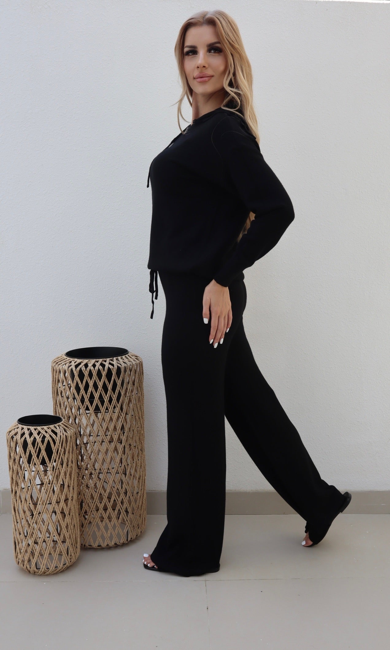 Female model wearing Bonnie Knitted Lounge Suit - Black- showcasing the latest ladies fashion with free delivery 