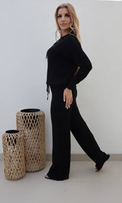 Female model wearing Bonnie Knitted Lounge Suit - Black- showcasing the latest ladies fashion with free delivery 