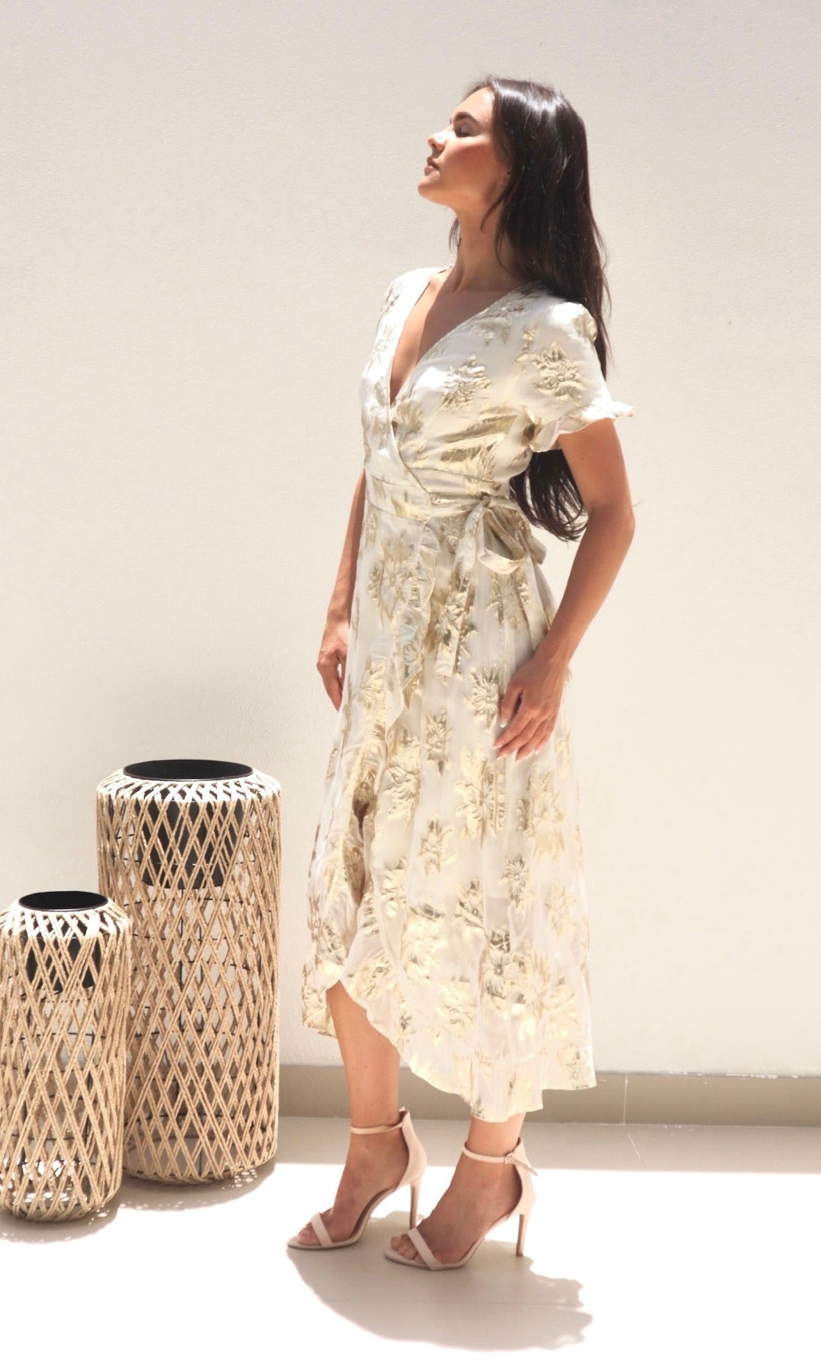 Female model wearing Yasmin Gold Wrap Dress - Cream / Gold- showcasing the latest ladies fashion with free delivery 