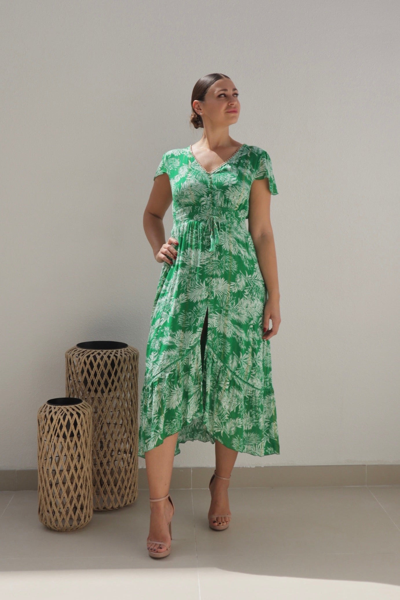 Female model wearing Annabelle Bead Edge High Low Dress - Green- showcasing the latest ladies fashion with free delivery 