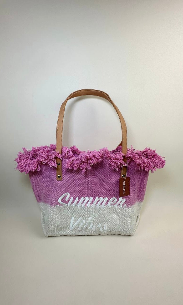 Female model wearing Summer Vibes Ombre Beach Bag - Hot Pink- showcasing the latest ladies fashion with free delivery 