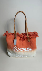 Female model wearing Summer Vibes Ombre Summer Beach Bag - Orange- showcasing the latest ladies fashion with free delivery 