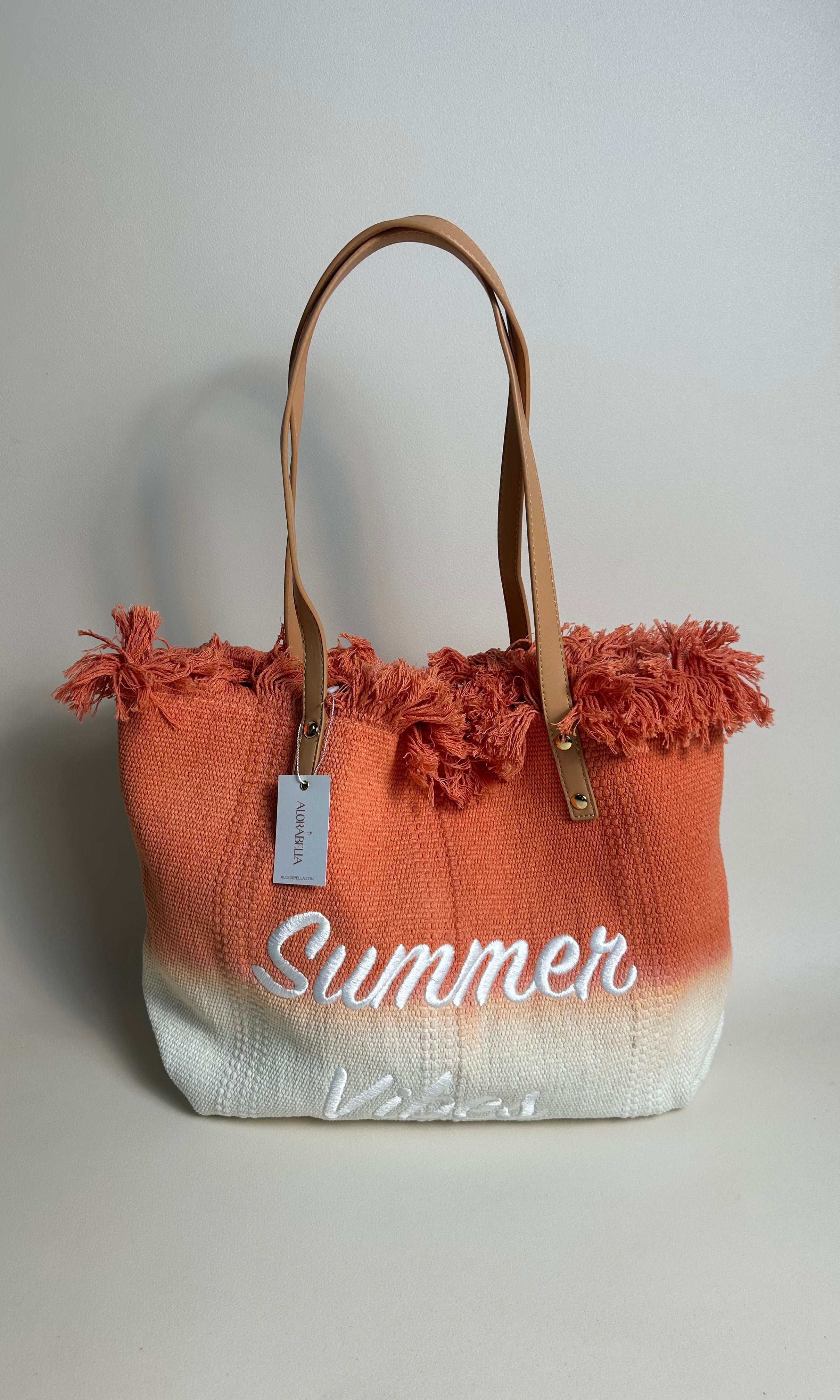 Female model wearing Summer Vibes Ombre Summer Beach Bag - Orange- showcasing the latest ladies fashion with free delivery 