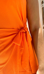 Female model wearing Olivia Strap Wrap-Over Dress - Orange- showcasing the latest ladies fashion with free delivery 