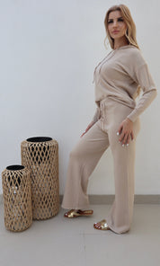 Female model wearing Bonnie Knitted Lounge Suit - Beige- showcasing the latest ladies fashion with free delivery 