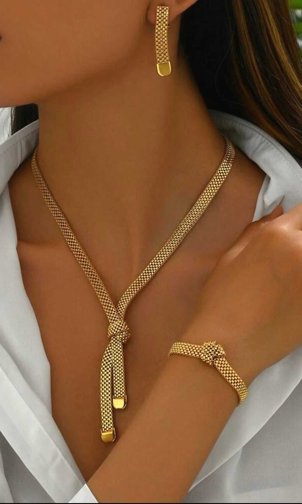 Female model wearing Diana Knotted Gold Set- showcasing the latest ladies fashion with free delivery 