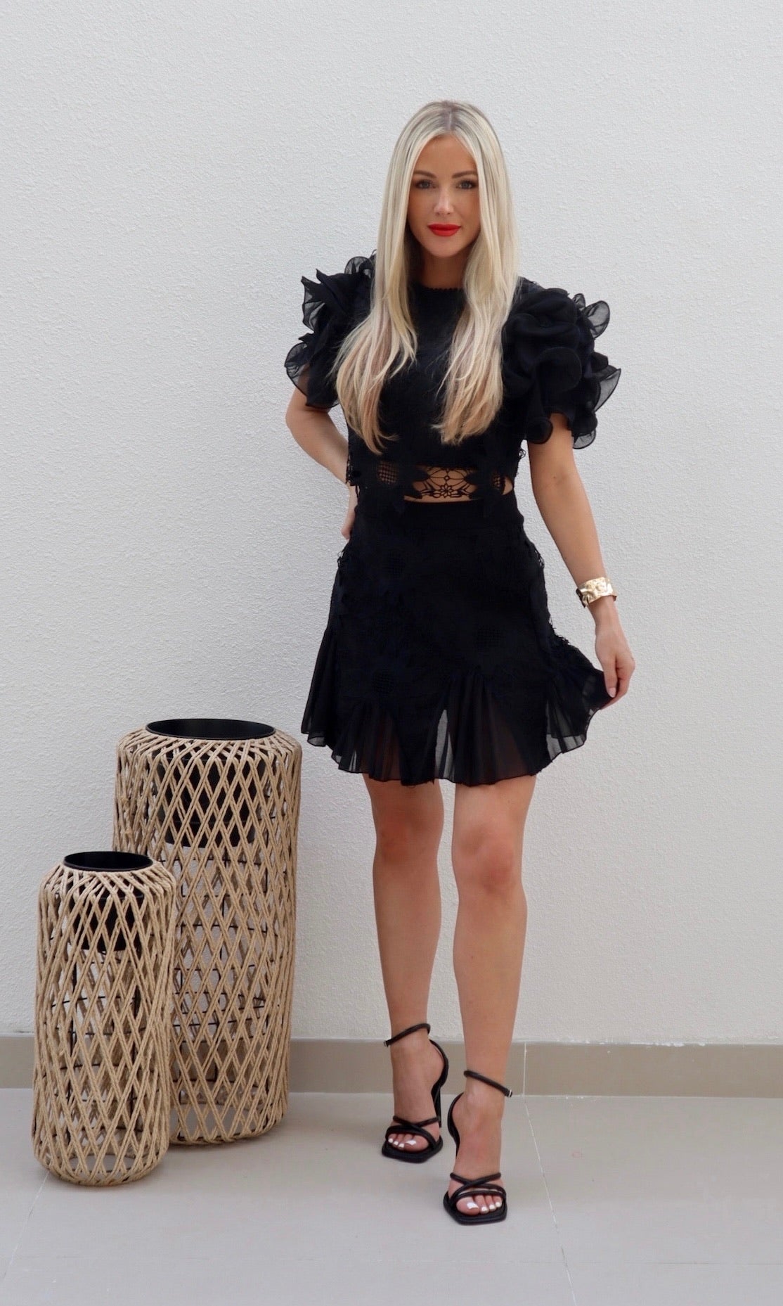 Female model wearing Phoebe Ruffle Top - Black- showcasing the latest ladies fashion with free delivery 