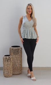 Female model wearing Amalie V-Neck Top - Sage- showcasing the latest ladies fashion with free delivery 