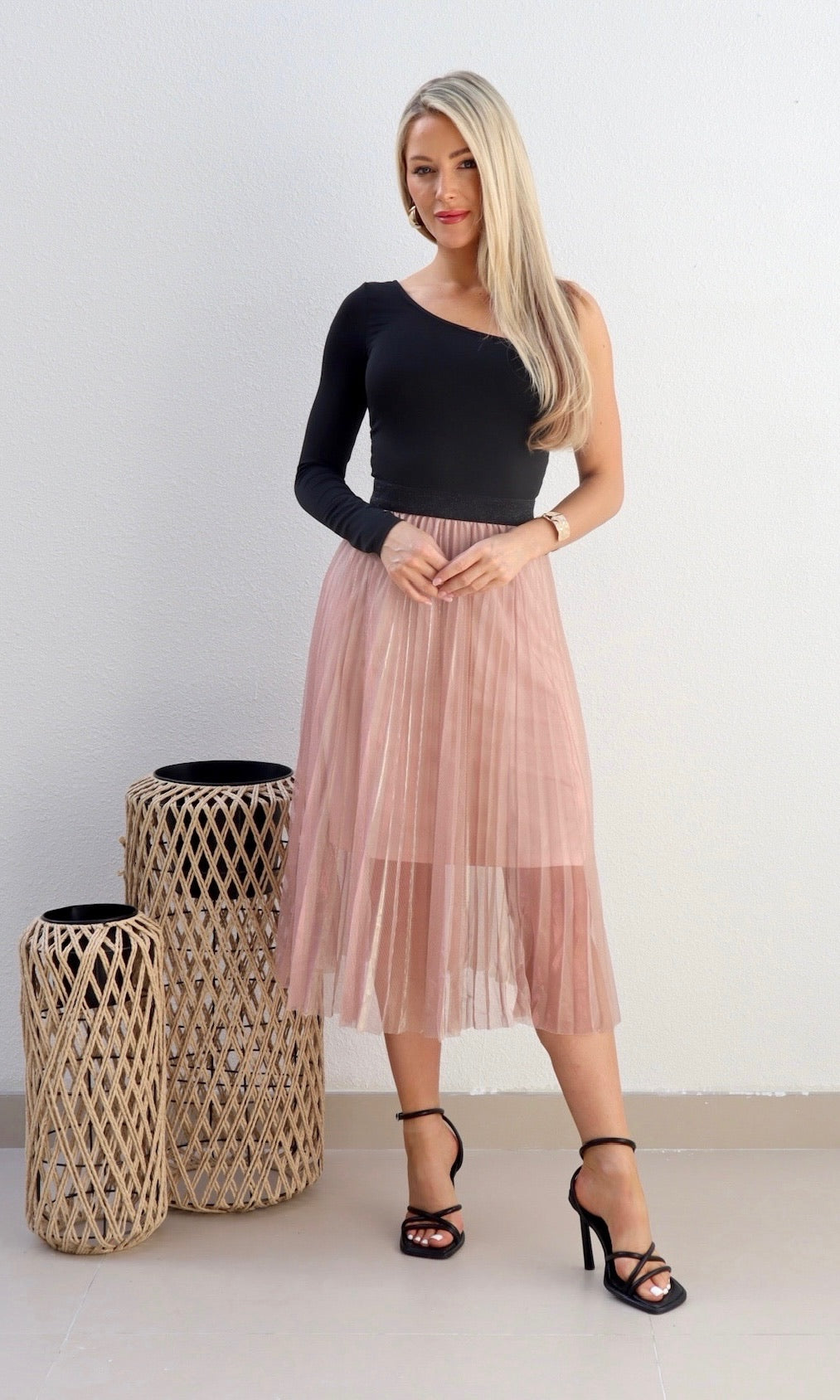 Female model wearing Sophie Pleat Shimmer Skirt - Pink- showcasing the latest ladies fashion with free delivery 