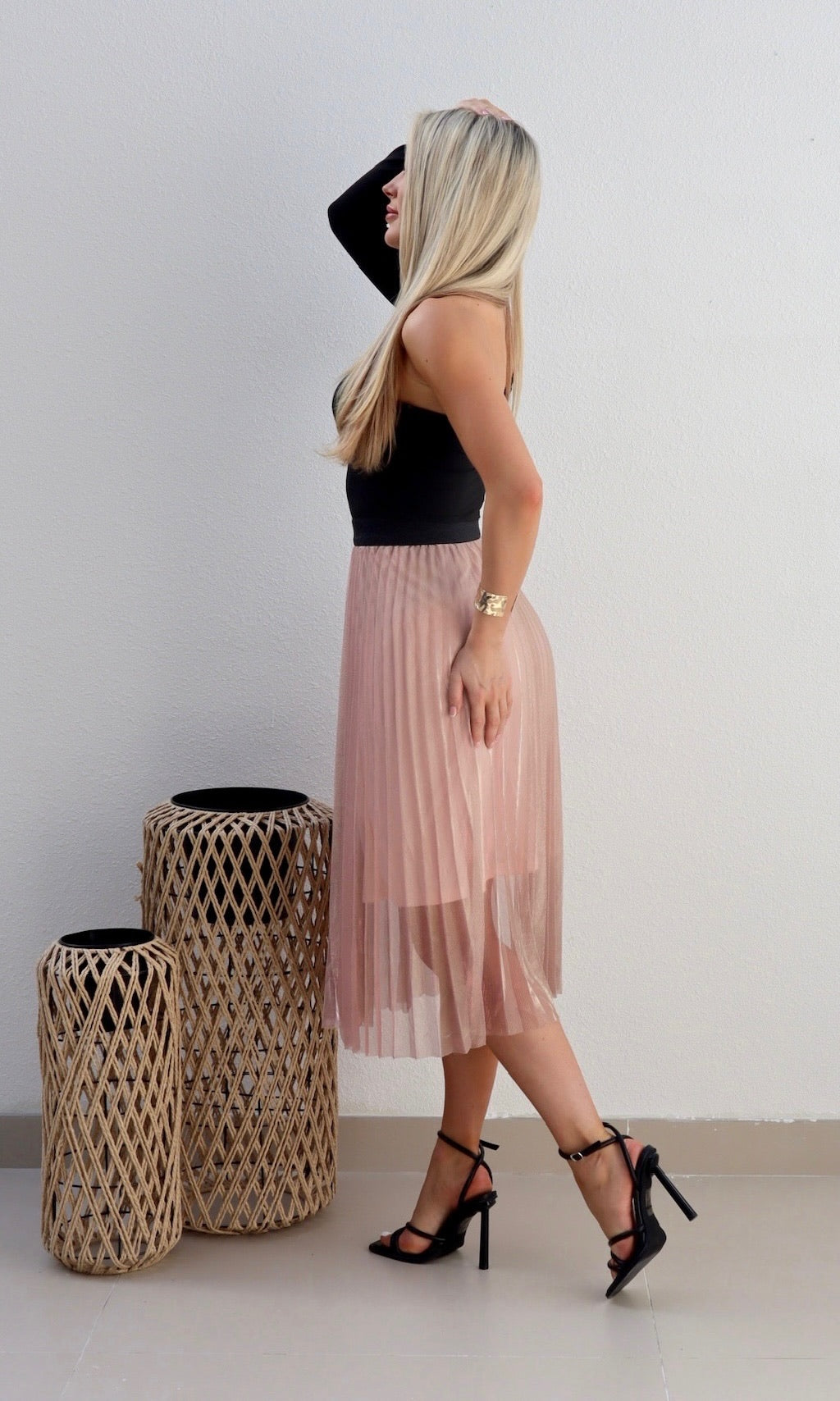 Female model wearing Sophie Pleat Shimmer Skirt - Pink- showcasing the latest ladies fashion with free delivery 