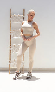 Female model wearing Beve Leggings and Sport Bra Set - Beige- showcasing the latest ladies fashion with free delivery 