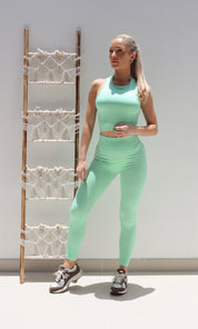 Female model wearing Beve Leggings and Sport Bra Set - Green- showcasing the latest ladies fashion with free delivery 