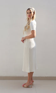 Female model wearing Carla knitted pleat Dress - Cream- showcasing the latest ladies fashion with free delivery 