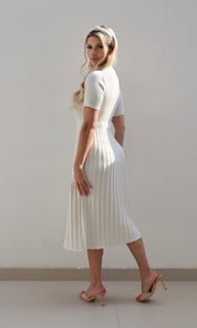 Female model wearing Carla knitted pleat Dress - Cream- showcasing the latest ladies fashion with free delivery 