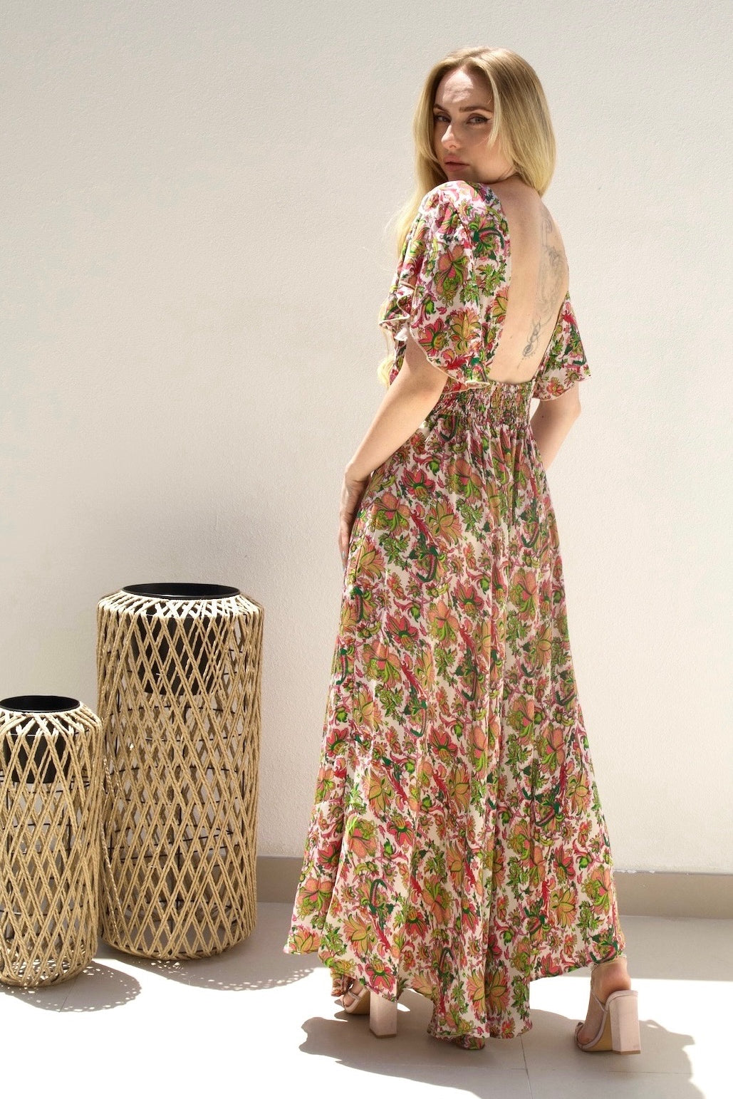 Female model wearing Daniela V-Front & Back Maxi - Pink Garden- showcasing the latest ladies fashion with free delivery 