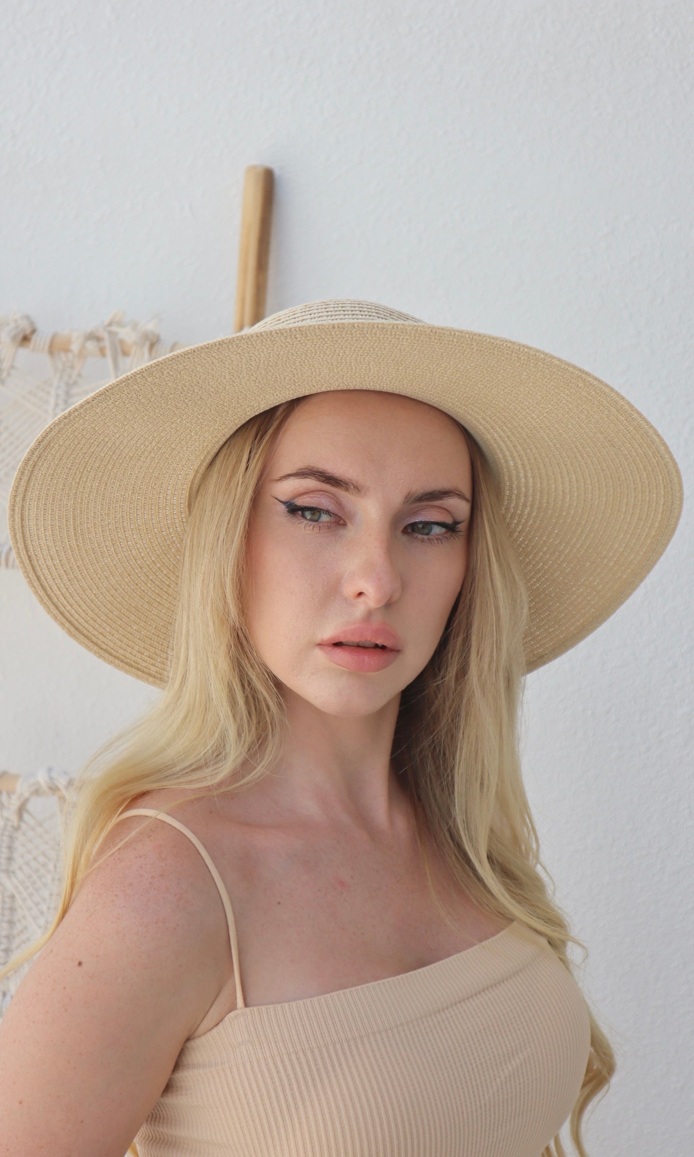 Female model wearing Angelica Straw Hat - Cream- showcasing the latest ladies fashion with free delivery 