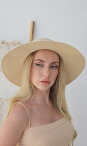 Female model wearing Angelica Straw Hat - Cream- showcasing the latest ladies fashion with free delivery 