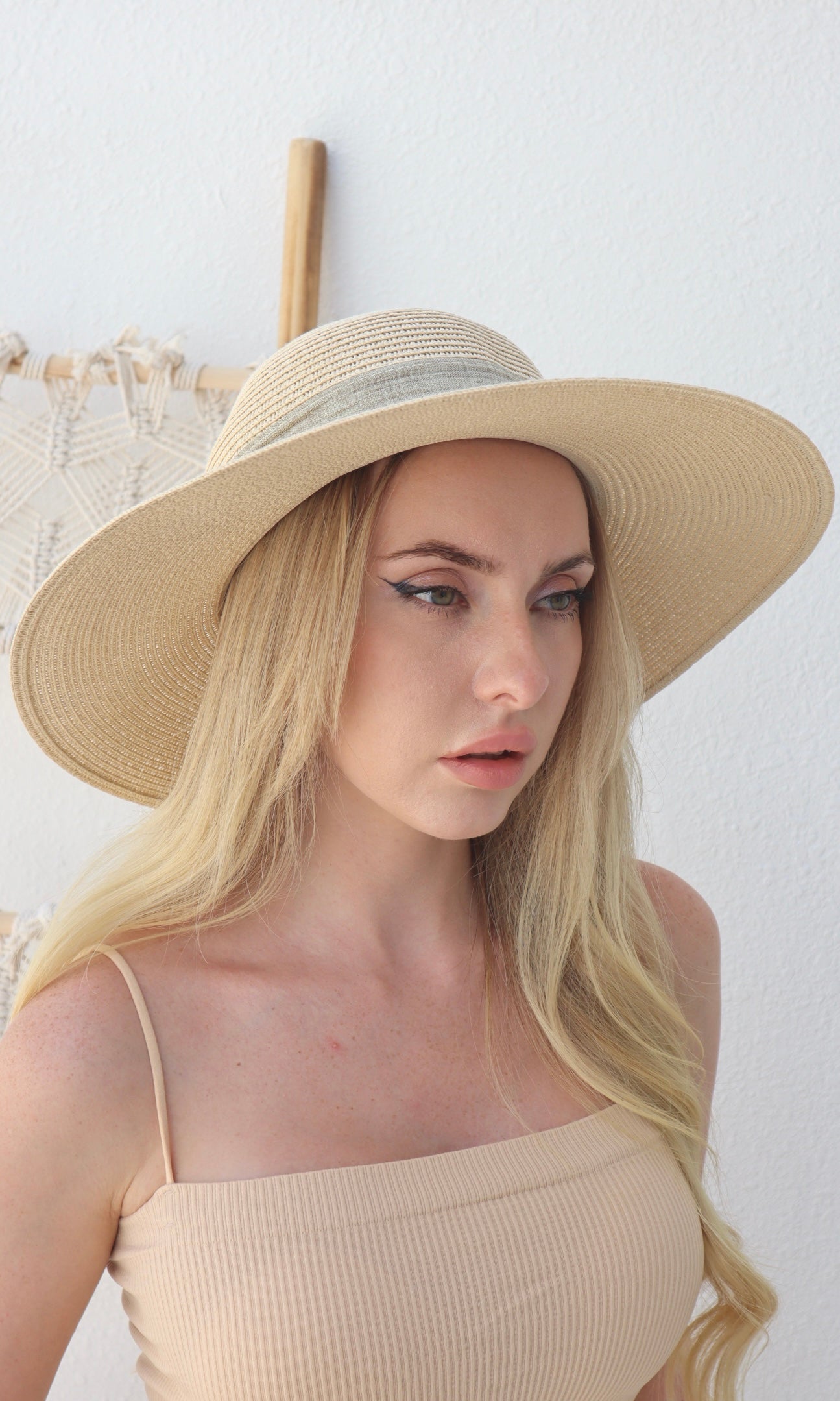 Female model wearing Angelica Straw Hat - Cream- showcasing the latest ladies fashion with free delivery 