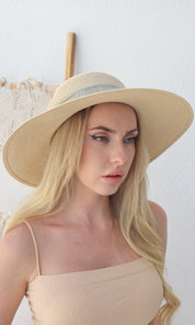 Female model wearing Angelica Straw Hat - Cream- showcasing the latest ladies fashion with free delivery 