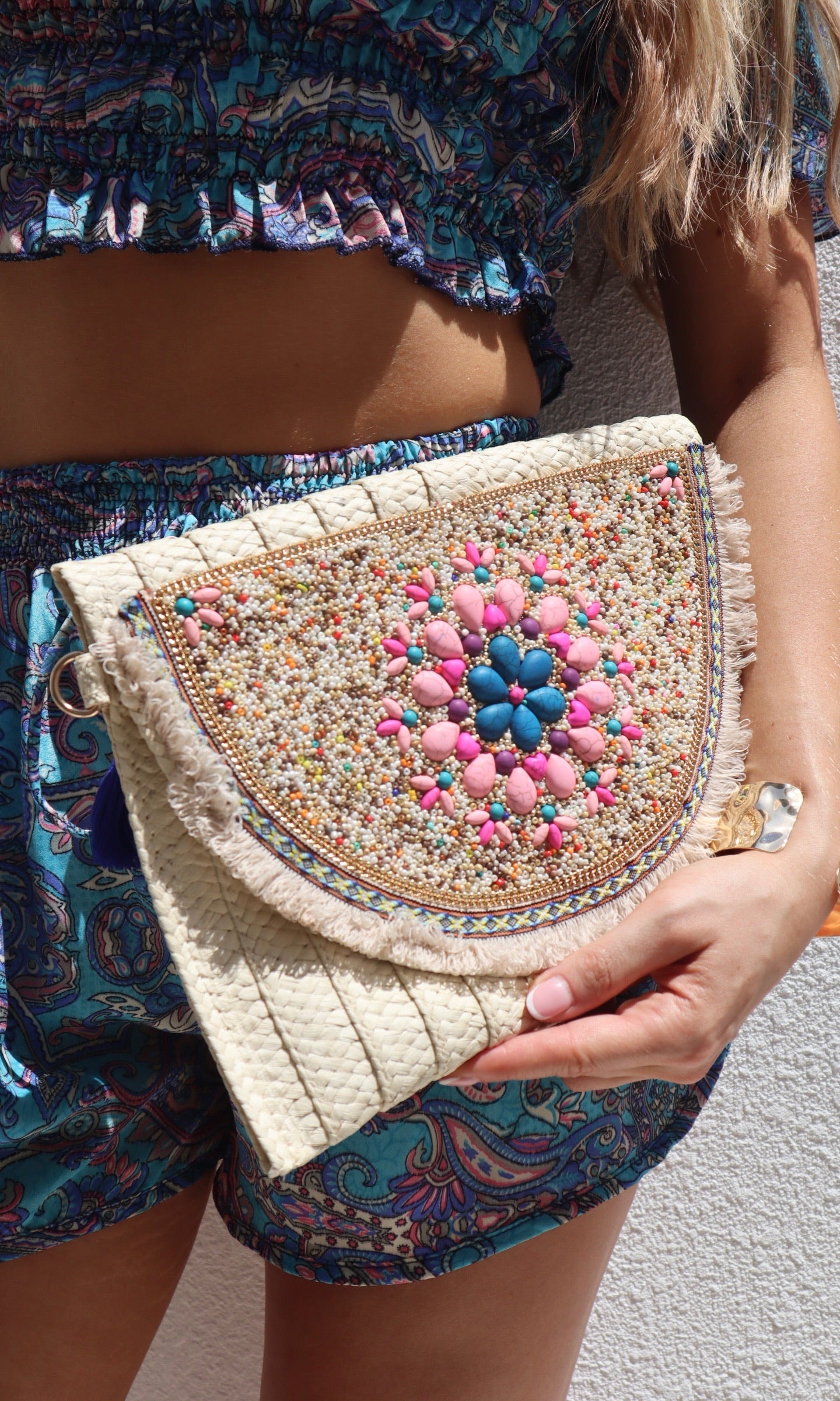 Female model wearing Jaz Bead Clutch - Cream- showcasing the latest ladies fashion with free delivery 